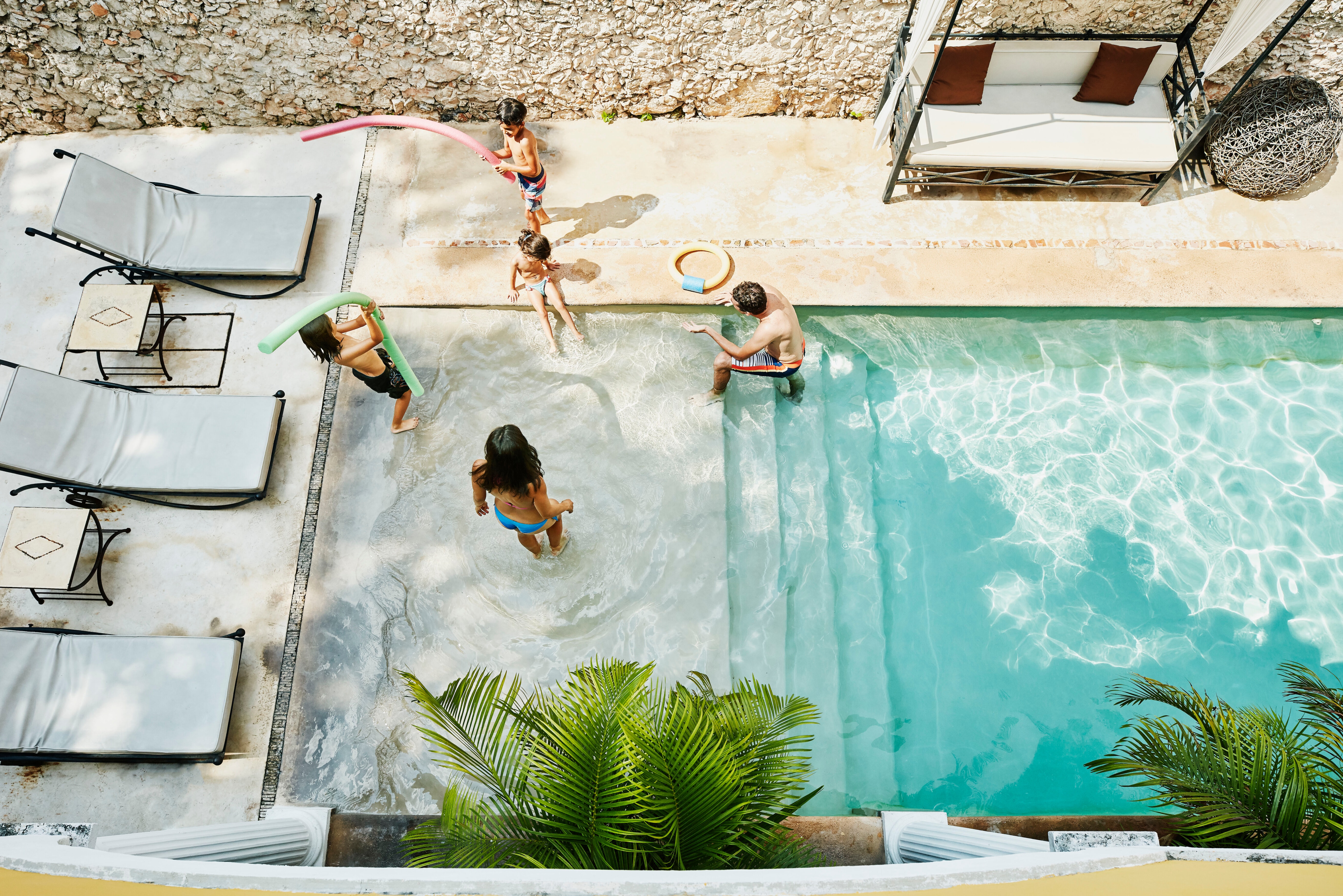 Man in infinity pool.